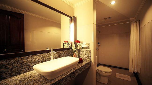 Urbanview Hotel Taman Suci Денпасар Стая снимка