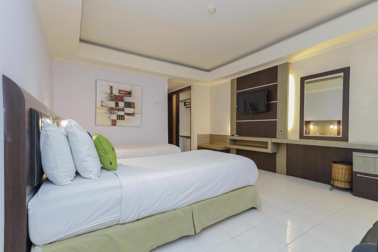 Urbanview Hotel Taman Suci Денпасар Екстериор снимка