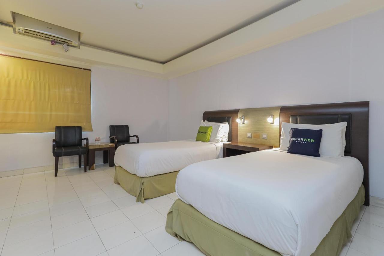 Urbanview Hotel Taman Suci Денпасар Екстериор снимка