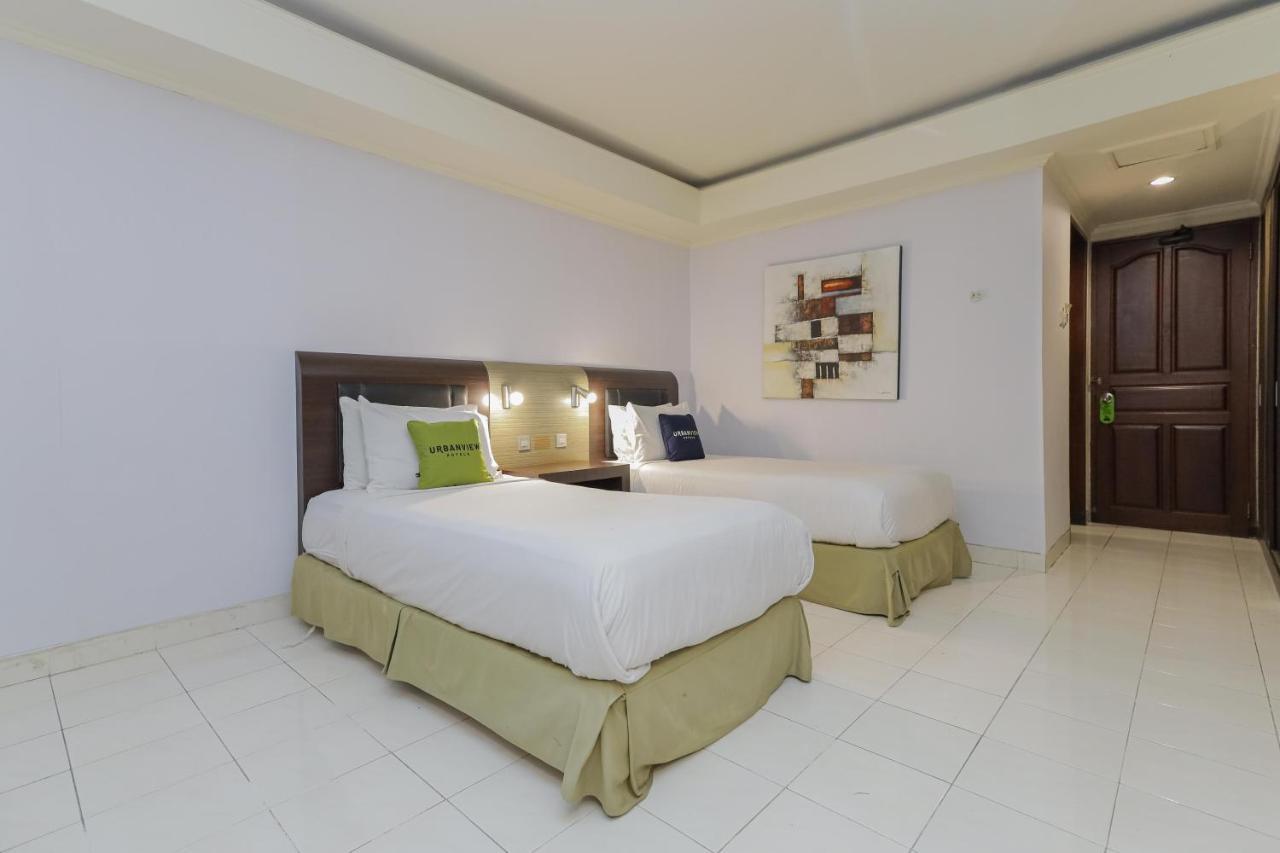 Urbanview Hotel Taman Suci Денпасар Екстериор снимка
