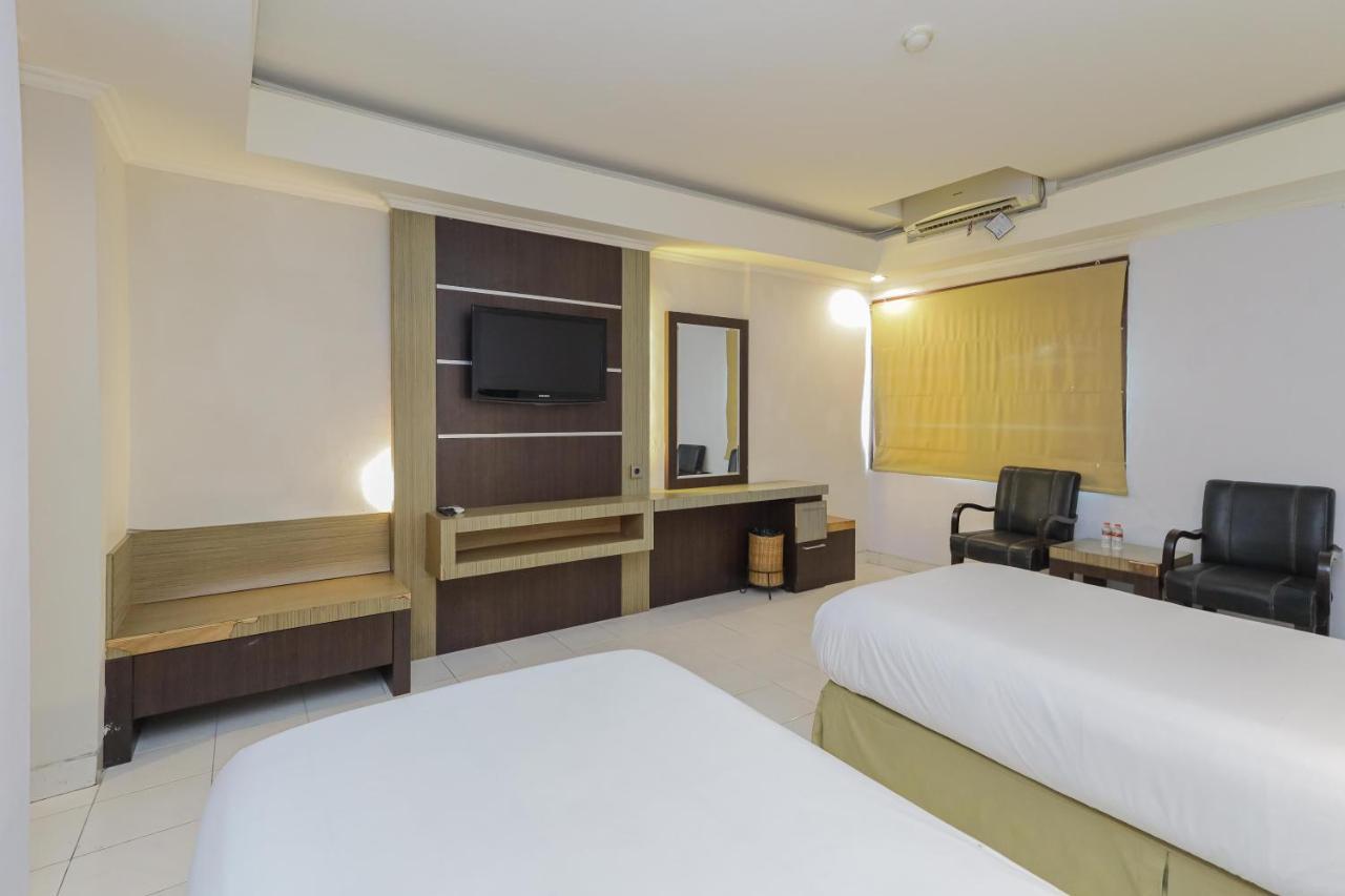 Urbanview Hotel Taman Suci Денпасар Екстериор снимка