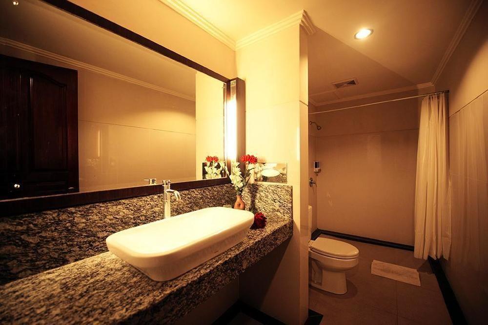 Urbanview Hotel Taman Suci Денпасар Стая снимка